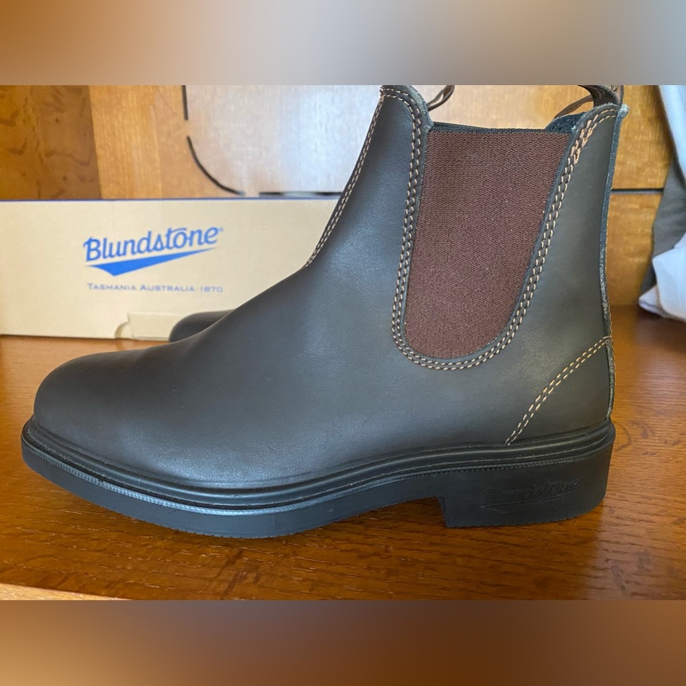 Blundstone Chelsea’s dark brown with dark red elastic insets.